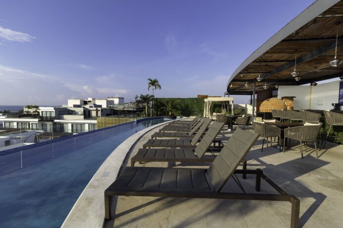 Estudio de Lujo en The Shore – Vive la Quinta Avenida a un Paso del Mar